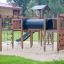 Eragon Spielanlage mit Tunnel und Rutsche auf einem Spielplatz