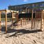 Eragon Spielanlage mit Tunnel und Rutsche auf einem Kinderspielplatz