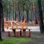 Tisch mit 4 Hocker Robinie aus Holz im Waldspielplatz