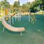 Spielplatz mit Rutsche und Klettergerüst Orion Kletteranlage mit Rutsche.