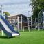Ursa Maior Kletteranlage mit Tunnel und Rutsche auf einem Spielplatz