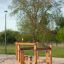 Spielplatz Trimm-dich-Pfade aus Holz mit Balancier- und Kletterelementen auf Sandboden.