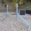 Kletterkombination Seestern auf Spielplatz mit Kletterseil und Rutsche.