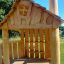 Tambora Spielhaus mit Rutsche Eco aus natürlichem Holz für den Außenbereich