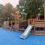 Bounty Spielschiff mit Tunnel und Rutsche auf Spielplatz mit blauem Boden