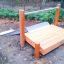 Hangrutsche breit h120 in einem Kinderspielplatz eingebettet in natürlicher Umgebung