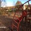 Panther Kletteranlage auf einem Spielplatz mit Rutsche, Schaukeln und Kletterseil