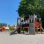 Schloss Camelot Spieltürme mit Rutsche auf einem Kinderspielplatz