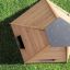 Holzspielhaus Wigwam Spielhaus für Kinder auf grünem Rasen, Draufsicht.