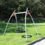 Nestschaukel Solaris (BNS 90 cm) aufgestellt im grünen Park.