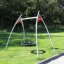 Nestschaukel Solaris (BNS 90 cm) aufgestellt im grünen Park.
