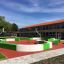 Moderner Spielplatz mit InsideOut BOX small R4819 in einem grünen und weißen Design vor einem Schulg